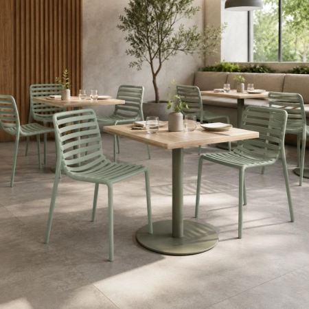 krzesło zewnętrzne Doga Bistrot Menta miętowe w aranżacji nowoczesnej restauracji ewoodland.pl